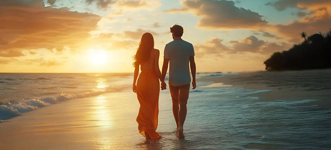 couple bonded walking on beach holding hands