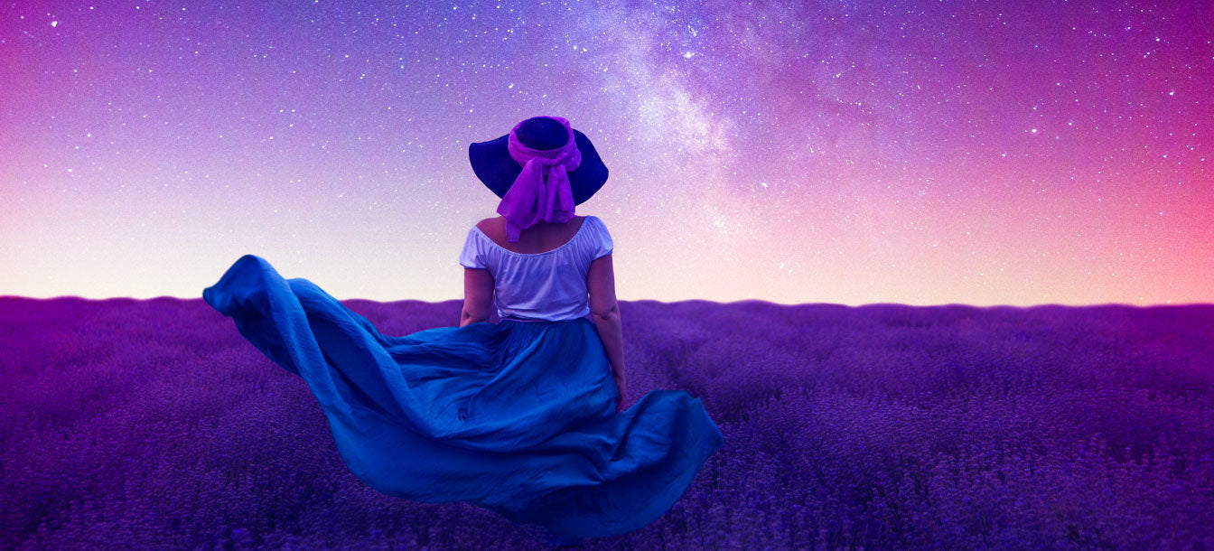 a woman in a field feeling confused